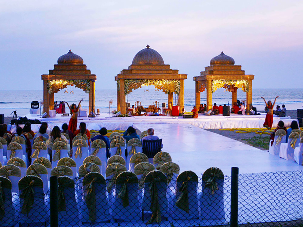 https://www.thelalit.com/wp-content/uploads/2021/08/beach-wedding-1.jpg